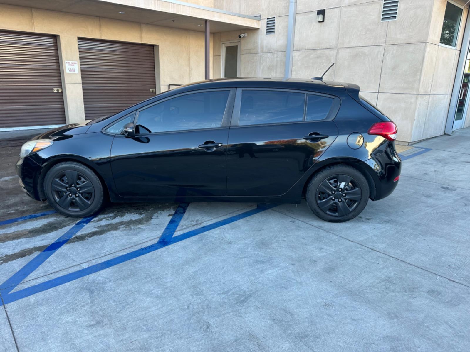 2016 Black /Black Kia Forte 5-Door Cloth (KNAFK5A87G5) with an 4 CYLINDER engine, Automatic transmission, located at 30 S. Berkeley Avenue, Pasadena, CA, 91107, (626) 248-7567, 34.145447, -118.109398 - Photo #1